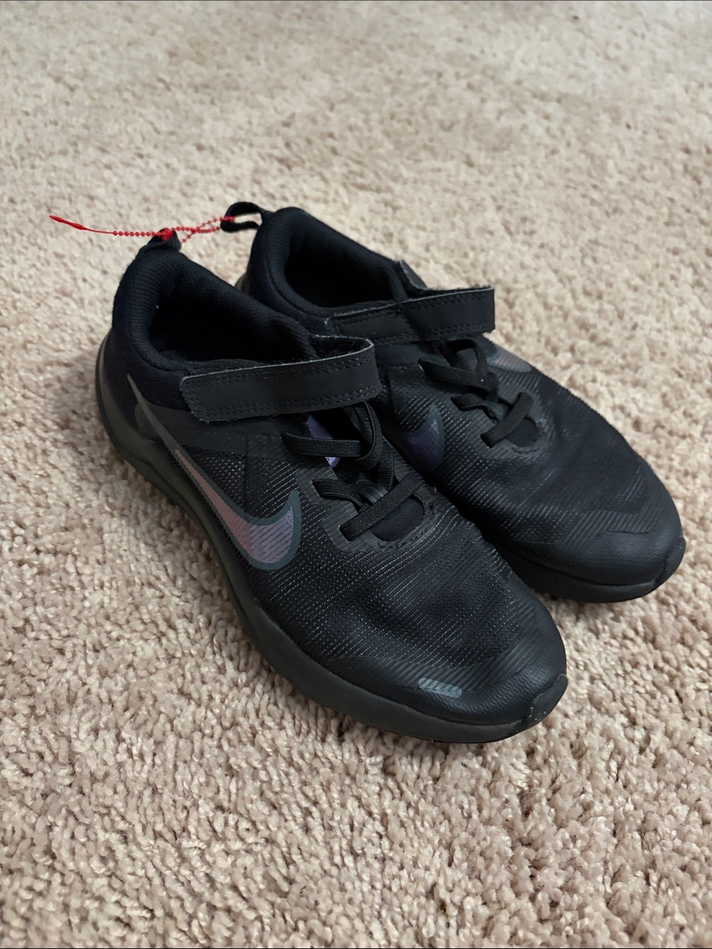 Nike Kids Black Sneakers with Iridescent Swoosh